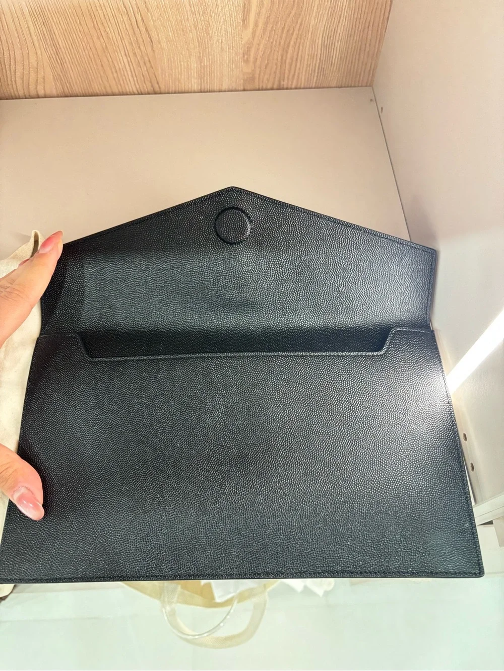 Saint Laurent Black Envelope Clutch retails now for 800$